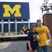 Michigan fans Kelli and Robert Derger, of Ubly, pose for a photo in front of the block M at Michigan Stadium on Saturday, September 7, 2013. Melanie Maxwell | AnnArbor.com
